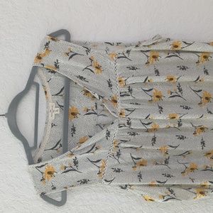 White sleeveless top